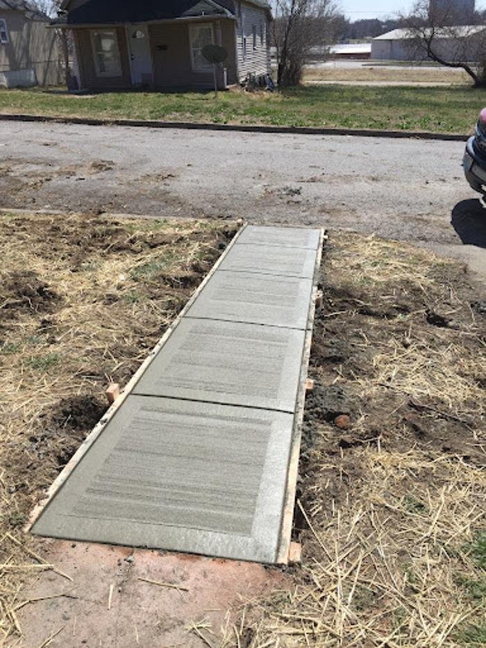 Finished concrete sidewalk at residential home, Kansas City metro